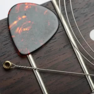 Read more about the article Ukulele Pick Vs Guitar Pick : Which is Best for Strumming in 2024?